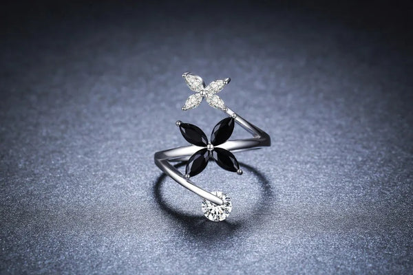 Womens Black Awn and White Silver Color Flower Ring