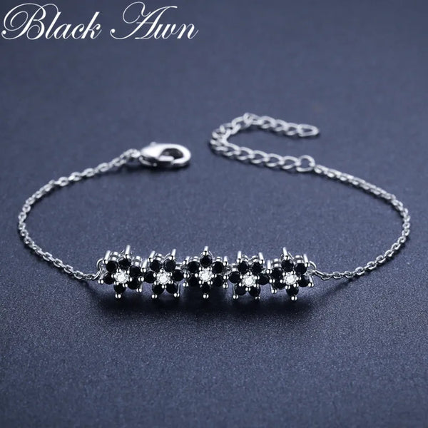 Womens BLACK AWN Silver Color Flower Bracelet